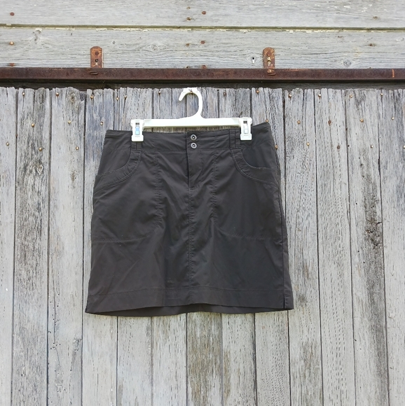 REI Dresses & Skirts - REI Dark Green Color Of Hiking Skirt Snap Back Pockets Mini Outdoor Womens Sz 6